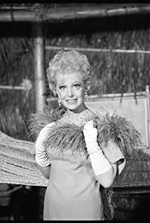 Natalie Schafer plays Mrs. Lovey Howell on Gilligans Island