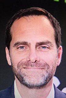 Andy Buckley plays David Wallace on The Office Us